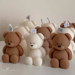 Handmade teddy bear candles in cream and brown colors, crafted by Je T’aime Candle. Cute decorative bear-shaped candles, perfect for gifts, baby showers, weddings, or cozy home décor.