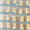 Mini Teddy Bear Candle in Gift Box with Personalized Label and Ribbon – a charming teddy bear-shaped candle, individually packaged with custom label and ribbon. Perfect for baby showers, gender reveals, and newborn celebrations, bringing warmth and a personal touch to any baby-themed event