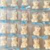 Mini Teddy Bear Candle in Gift Box with Personalized Label and Ribbon – a charming teddy bear-shaped candle, individually packaged with custom label and ribbon. Perfect for baby showers, gender reveals, and newborn celebrations, bringing warmth and a personal touch to any baby-themed event