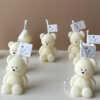 Mini Teddy Bear Candle in Gift Box with Personalized Label and Ribbon – a charming teddy bear-shaped candle, individually packaged with custom label and ribbon. Perfect for baby showers, gender reveals, and newborn celebrations, bringing warmth and a personal touch to any baby-themed event