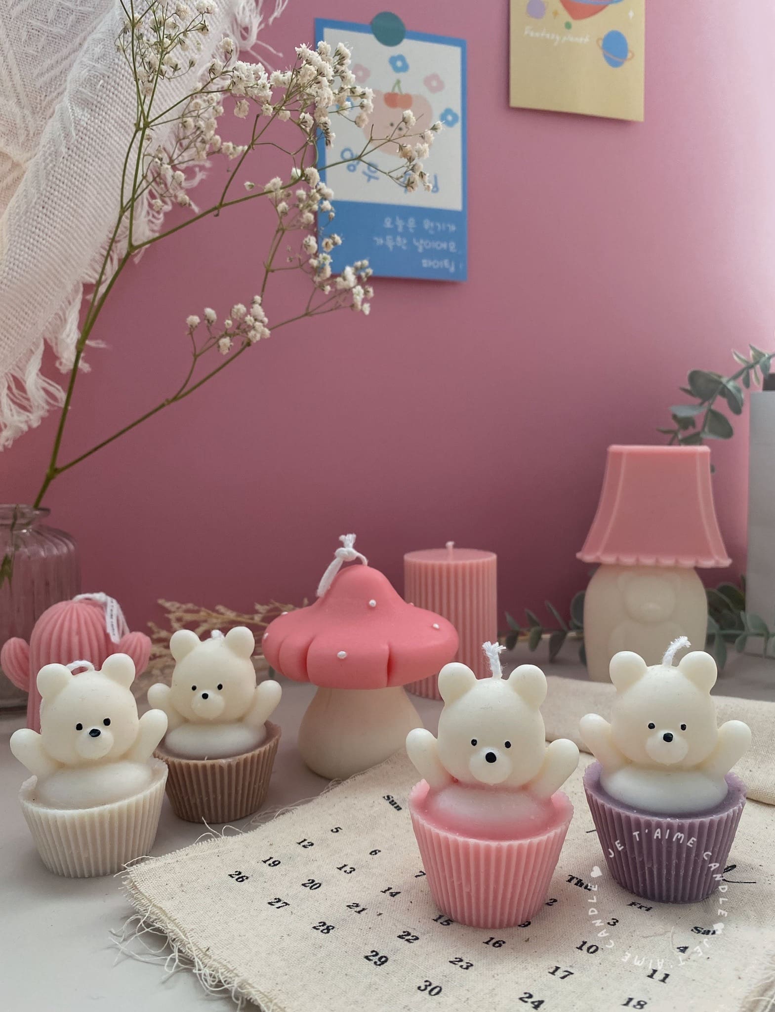 Set of handcrafted Muffin Teddy Bear Candles made from natural soy wax, designed in pastel cupcake holders in pink, purple, and brown. Cute decorative bear-shaped candles ideal for home décor, nursery styling, birthday gifts, anniversaries, baby showers, or special occasions. Handmade in the UK, these kawaii aesthetic candles add a cozy, unique, and charming touch to any space.