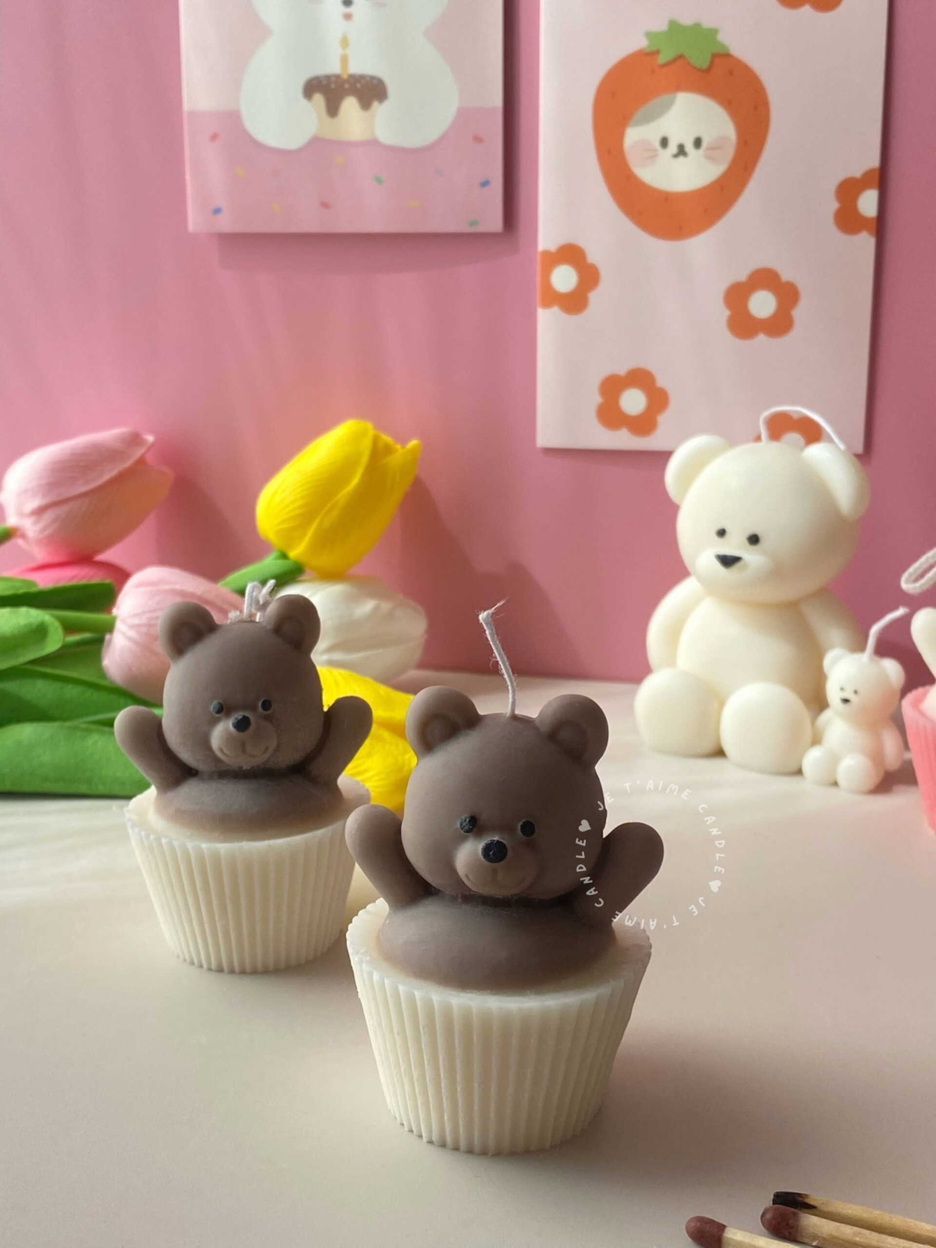 Set of handcrafted Muffin Teddy Bear Candles made from natural soy wax, designed in cupcake holders in white and brown. Cute decorative bear-shaped candles ideal for home décor, nursery styling, birthday gifts, anniversaries, baby showers, or special occasions. Handmade in the UK, these kawaii aesthetic candles add a cozy, unique, and charming touch to any space.