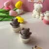 Set of handcrafted Muffin Teddy Bear Candles made from natural soy wax, designed in cupcake holders in white and brown. Cute decorative bear-shaped candles ideal for home décor, nursery styling, birthday gifts, anniversaries, baby showers, or special occasions. Handmade in the UK, these kawaii aesthetic candles add a cozy, unique, and charming touch to any space.