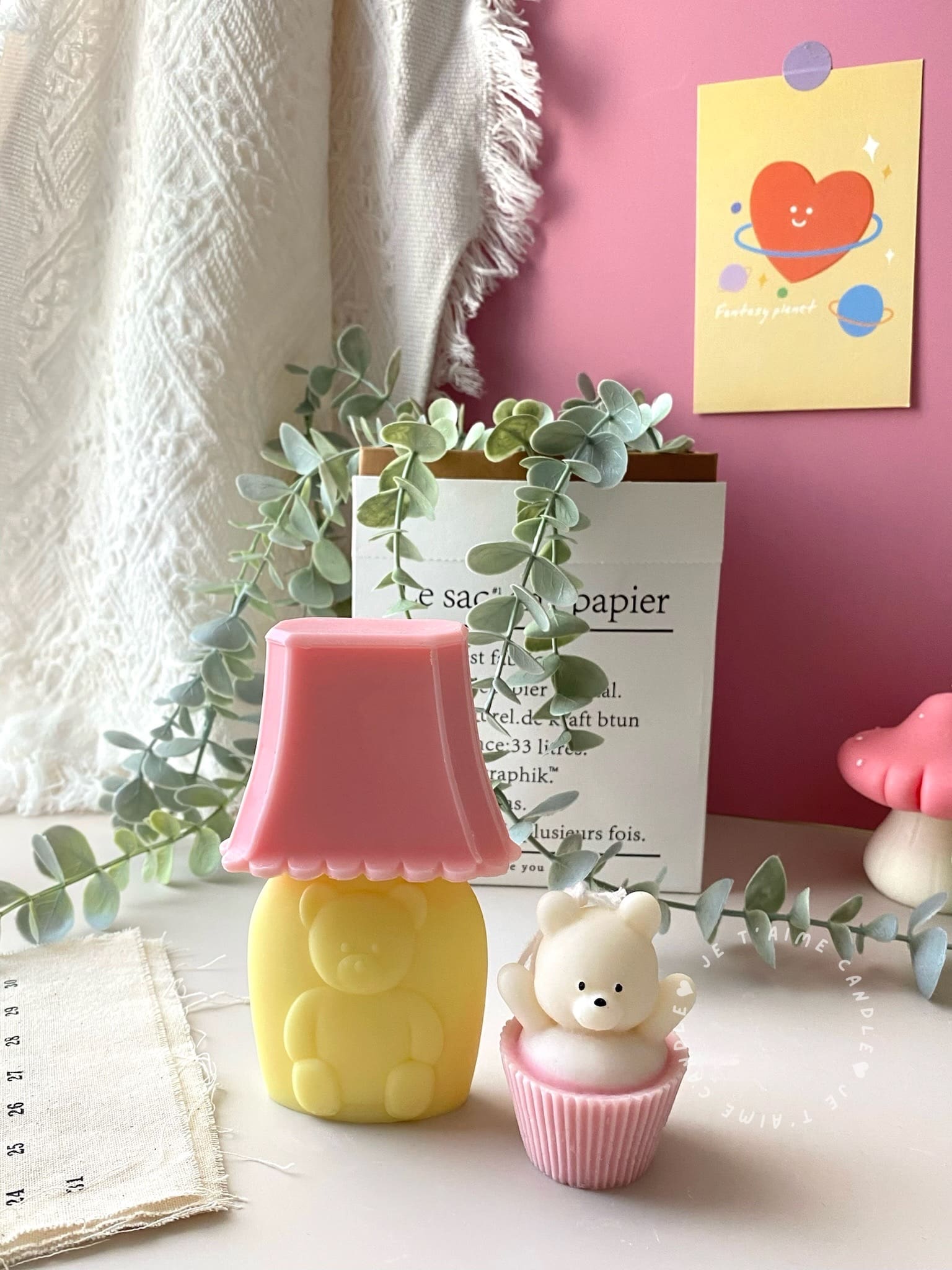 Set of handcrafted Muffin Teddy Bear Candles made from natural soy wax, designed in pastel cupcake holders in pink, purple, and brown. Cute decorative bear-shaped candles ideal for home décor, nursery styling, birthday gifts, anniversaries, baby showers, or special occasions. Handmade in the UK, these kawaii aesthetic candles add a cozy, unique, and charming touch to any space.