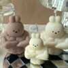 Set of 2 buff bunny bear candle