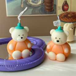 Handmade pumpkin cute bear candle – kawaii Halloween decoration and cozy autumn home accent.