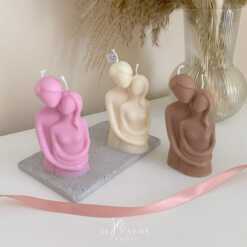 Three beautifully designed candles in white, pink and brown, perfect for a romantic gift or anniversary celebration.