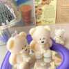 Handmade teddy bear candles in cream colors, crafted by Je T’aime Candle. Cute decorative bear-shaped candles, perfect for gifts, baby showers, weddings, or cozy home décor.
