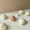 Cute chubby cat candle with rounded design, eco-friendly soy wax decor piece.