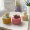 A collection of small animal candle, evoking a cozy hot spring bath atmosphere.