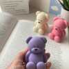 Handmade teddy bear candles in cream, pink and lavender colors, crafted by Je T’aime Candle. Cute decorative bear-shaped candles, perfect for gifts, baby showers, weddings, or cozy home décor.