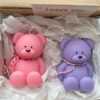 Handmade teddy bear candles in pink and lavender colors, crafted by Je T’aime Candle. Cute decorative bear-shaped candles, perfect for gifts, baby showers, weddings, or cozy home décor.