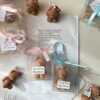 Mini Teddy Bear Candle in Gift Box with Personalized Label and Ribbon – a charming teddy bear-shaped candle, individually packaged with custom label and ribbon. Perfect for baby showers, gender reveals, and newborn celebrations, bringing warmth and a personal touch to any baby-themed event