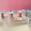 Mini Teddy Bear Candle in Gift Box with Personalized Label and Ribbon – a charming teddy bear-shaped candle, individually packaged with custom label and ribbon. Perfect for baby showers, gender reveals, and newborn celebrations, bringing warmth and a personal touch to any baby-themed event