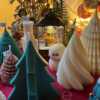 A handcrafted Abstract Christmas Tree Candle, designed to enhance holiday decor. The candle features a unique abstract design that captures the essence of the season, making it a beautiful centerpiece for a winter Christmas table. Its warm, flickering light adds a cozy ambiance, embodying the holiday spirit.