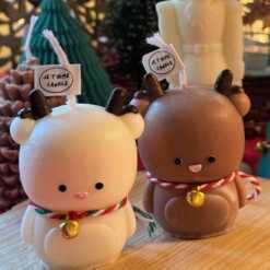 Handcrafted Baby Deer Candle with a cute deer shape, perfect for Christmas decor. This charming candle adds a festive touch to any space, serving as a delightful centerpiece or a thoughtful gift to bring warmth and holiday cheer.