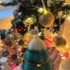 Handcrafted Christmas tree candle made from high-quality soy wax, decorated with a twine bow and small jingle bells. Perfect for holiday decor or as a gift, this festive candle adds charm to any space.