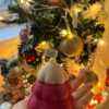 Handcrafted Christmas tree candle made from high-quality soy wax, decorated with a twine bow and small jingle bells. Perfect for holiday decor or as a gift, this festive candle adds charm to any space.