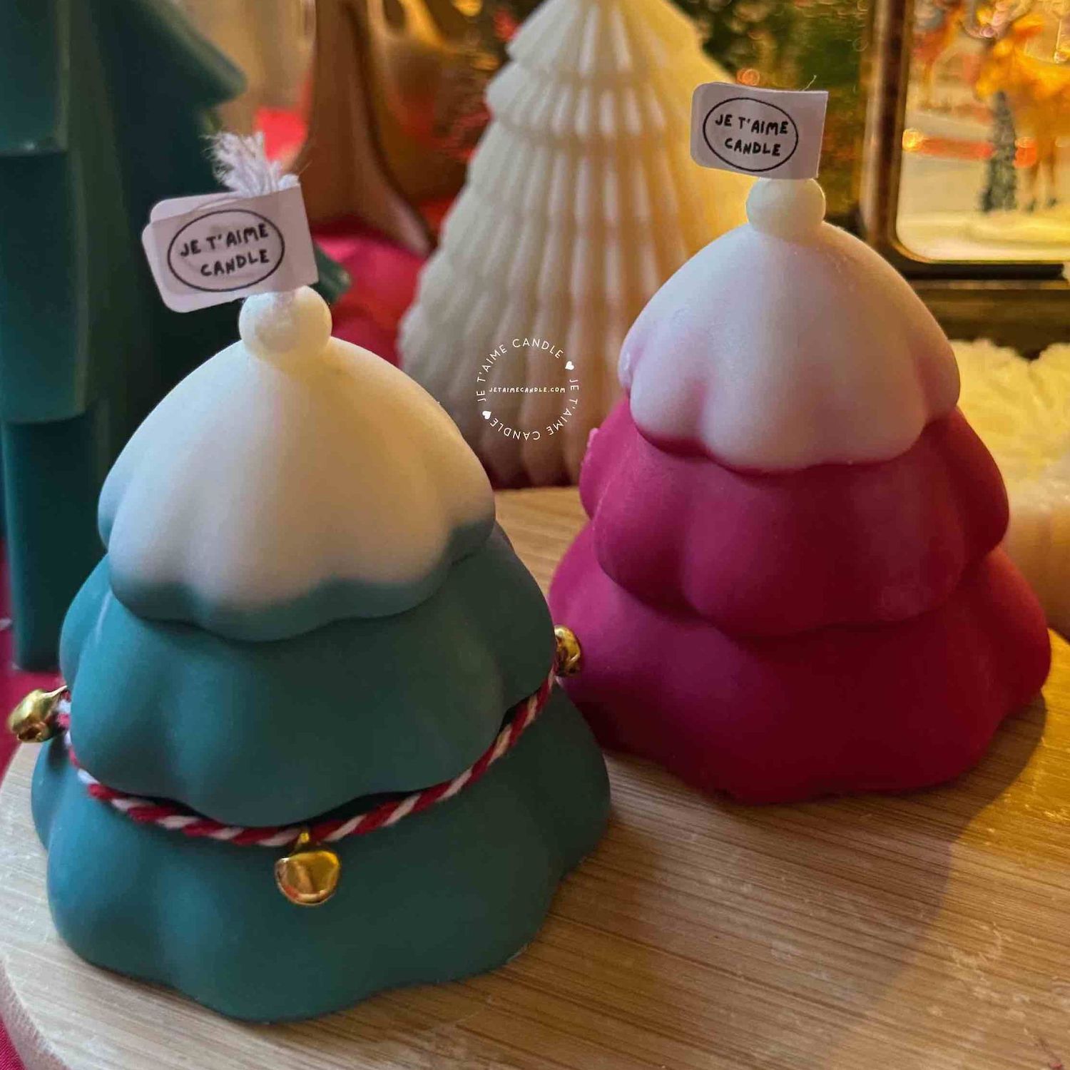Handcrafted Christmas tree candle made from high-quality soy wax, decorated with a twine bow and small jingle bells. Perfect for holiday decor or as a gift, this festive candle adds charm to any space.
