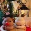 Celebrate the festive season with our enchanting Cute Reindeer Candle. Handcrafted with love, this adorable elk-shaped candle adds a magical touch to your Christmas decor. Perfect as a centerpiece or a thoughtful gift, its charming design brings warmth and cheer to any holiday celebration. Illuminate your home with the whimsical spirit of the season with this delightful scented Reindeer Candle. Cute Reindeer Christmas Tree Scented Candle • Width: 5.5 cm • Height: 7 cm • Weight: Approximately 95 g