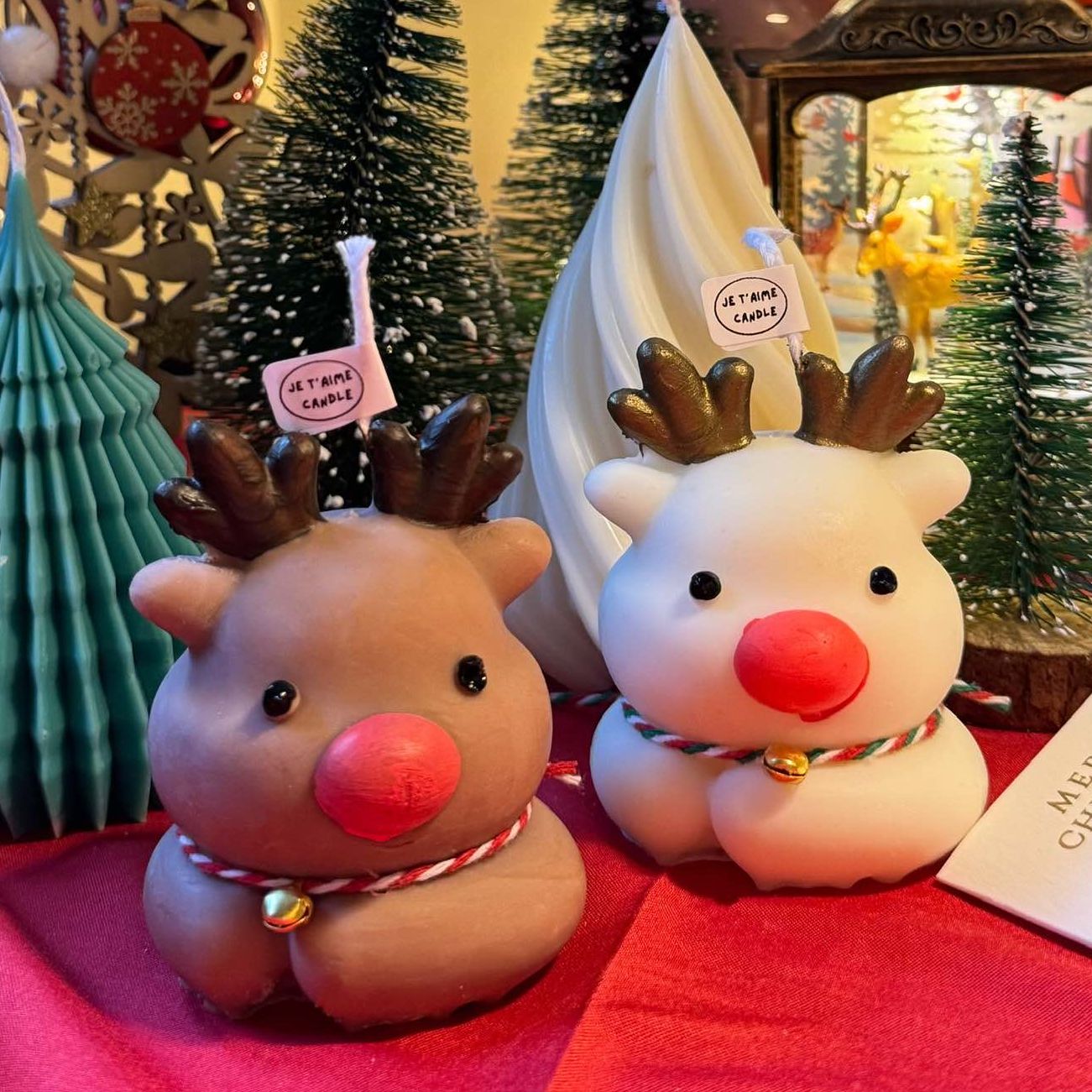 Celebrate the festive season with our enchanting Cute Reindeer Candle. Handcrafted with love, this adorable elk-shaped candle adds a magical touch to your Christmas decor. Perfect as a centerpiece or a thoughtful gift, its charming design brings warmth and cheer to any holiday celebration. Illuminate your home with the whimsical spirit of the season with this delightful scented Reindeer Candle. Cute Reindeer Christmas Tree Scented Candle • Width: 5.5 cm • Height: 7 cm • Weight: Approximately 95 g