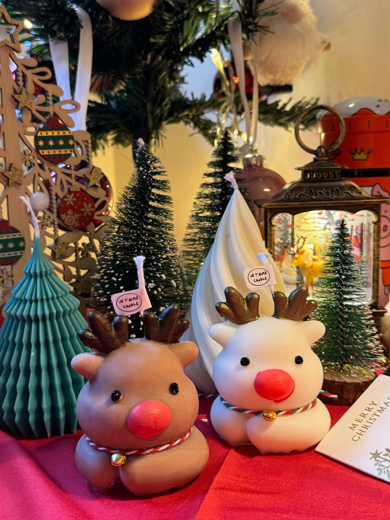 Celebrate the festive season with our enchanting Cute Reindeer Candle. Handcrafted with love, this adorable elk-shaped candle adds a magical touch to your Christmas decor. Perfect as a centerpiece or a thoughtful gift, its charming design brings warmth and cheer to any holiday celebration. Illuminate your home with the whimsical spirit of the season with this delightful scented Reindeer Candle. Cute Reindeer Christmas Tree Scented Candle • Width: 5.5 cm • Height: 7 cm • Weight: Approximately 95 g