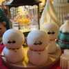 An adorable handmade snowman candles, perfect for Christmas decor or holiday gifts. Each candle features a snowman with a cute sunglasses and a holiday bell, crafted from high-quality wax for a clean burn. The charming design adds warmth and festive cheer to any room, ideal for winter themes or cozy home decor.