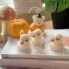 Adorable Halloween-themed ghost and pumpkin candles set, featuring cute ghost and pumpkin shapes as tealights, perfect for cozy autumn and spooky decor