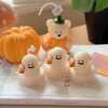 Adorable Halloween-themed ghost and pumpkin candles set, featuring cute ghost and pumpkin shapes as tealights, perfect for cozy autumn and spooky decor