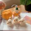 Adorable Halloween-themed ghost and pumpkin candles set, featuring cute ghost and pumpkin shapes as tealights, perfect for cozy autumn and spooky decor