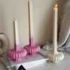These are beautifully designed decorative candles with a unique aesthetic. The candles have an ombre effect that fades from a vibrant color at the bottom (pink, purple, and blue) to a creamy white at the top.