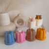 An assortment of small cakes arranged on a table, perfect for sharing sweet moments and special occasions.