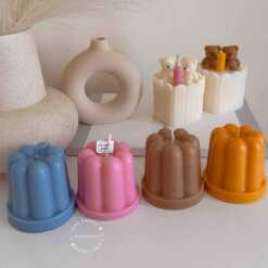 An assortment of small cakes arranged on a table, perfect for sharing sweet moments and special occasions.