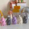 Adorable mouse figurines gathered on a table, perfect for bringing a playful vibe to your decor.