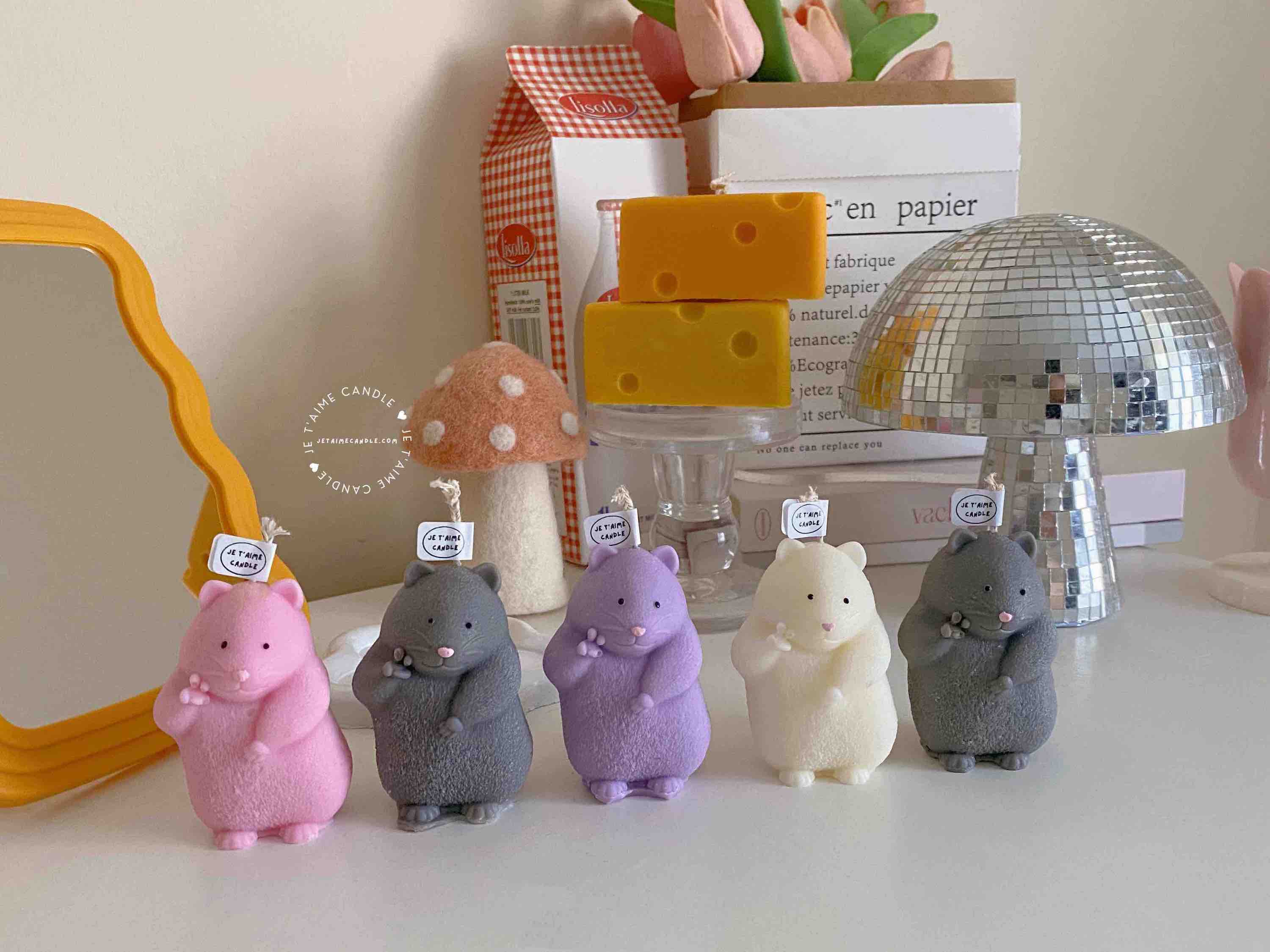 Adorable mouse figurines gathered on a table, perfect for bringing a playful vibe to your decor.