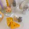 Adorable mouse figurines gathered on a table, perfect for bringing a playful vibe to your decor.