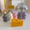 Adorable mouse figurines gathered on a table, perfect for bringing a playful vibe to your decor.