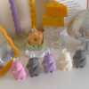 Adorable mouse figurines gathered on a table, perfect for bringing a playful vibe to your decor.
