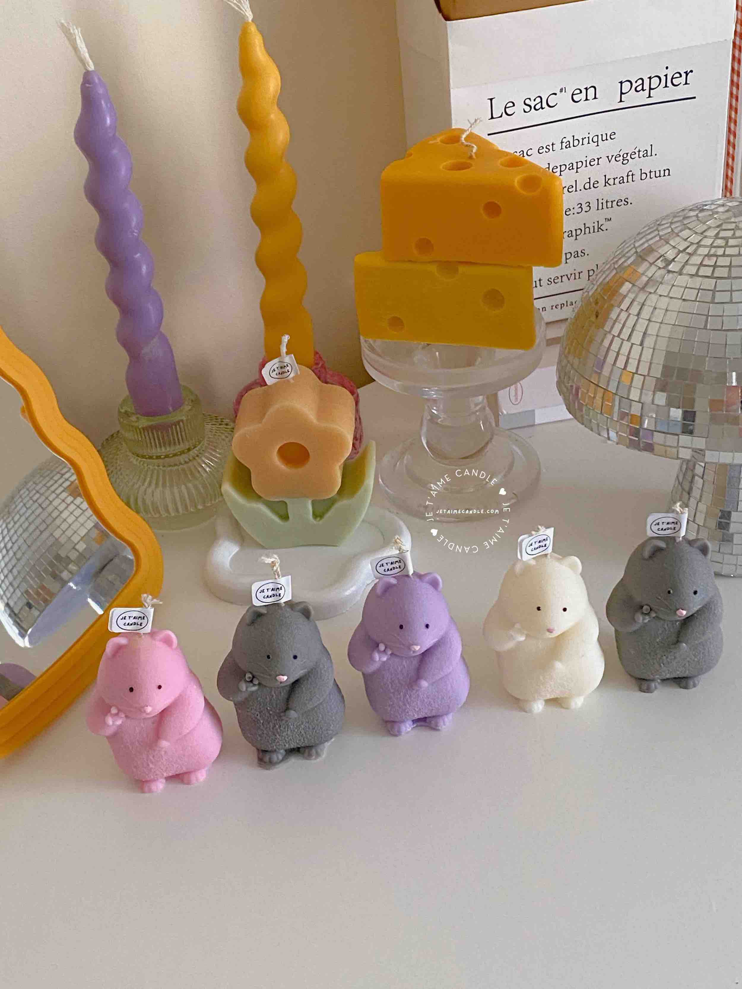 Adorable mouse figurines gathered on a table, perfect for bringing a playful vibe to your decor.