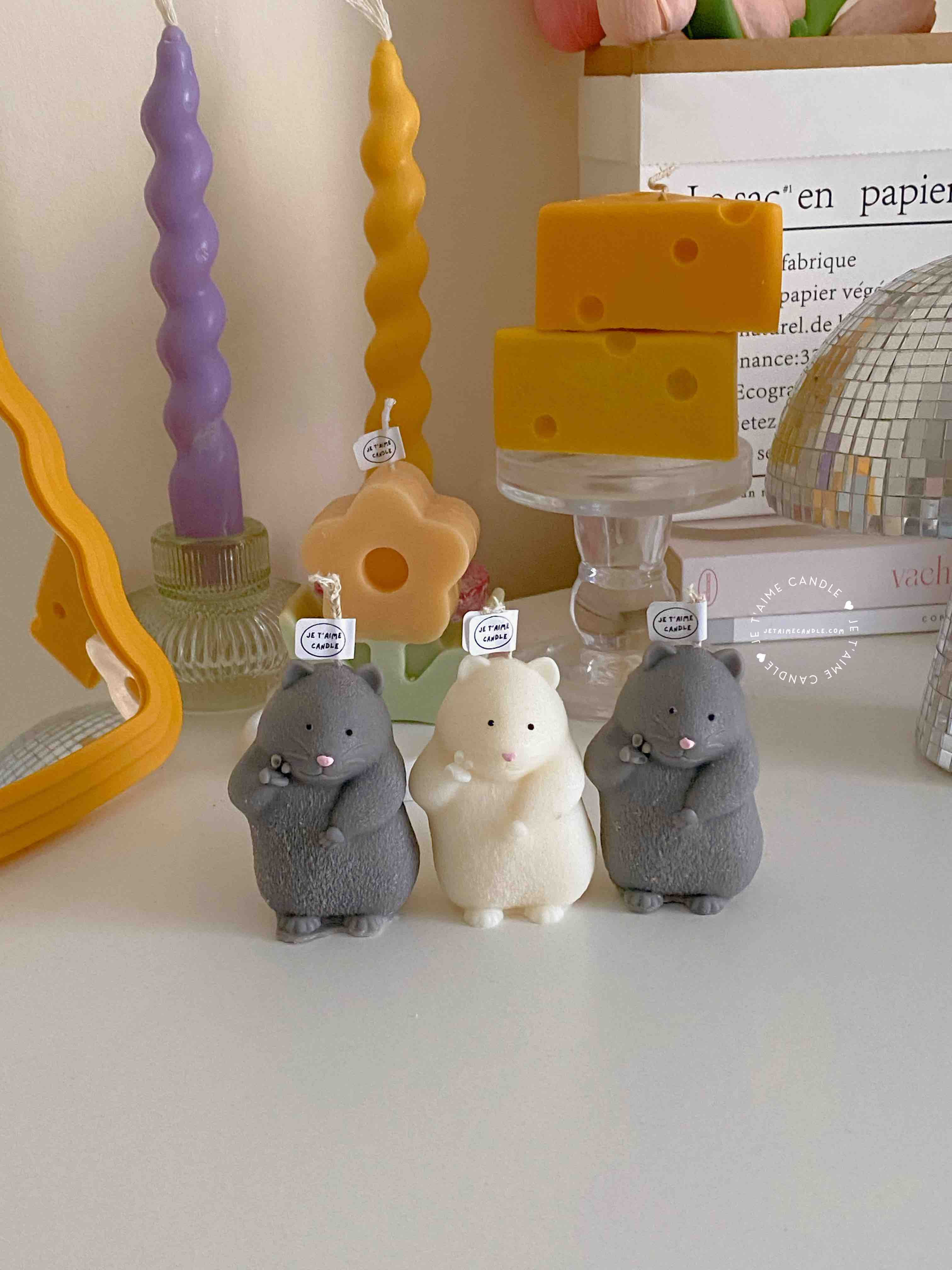 Adorable mouse figurines gathered on a table, perfect for bringing a playful vibe to your decor.