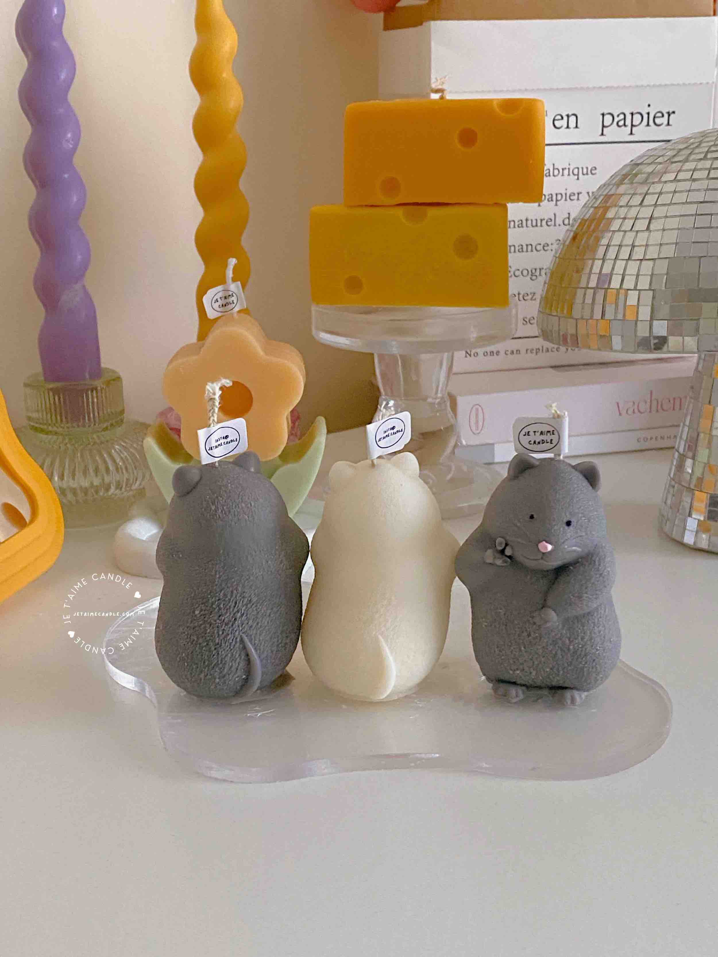 Adorable mouse figurines gathered on a table, perfect for bringing a playful vibe to your decor.