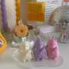 Adorable mouse figurines gathered on a table, perfect for bringing a playful vibe to your decor.