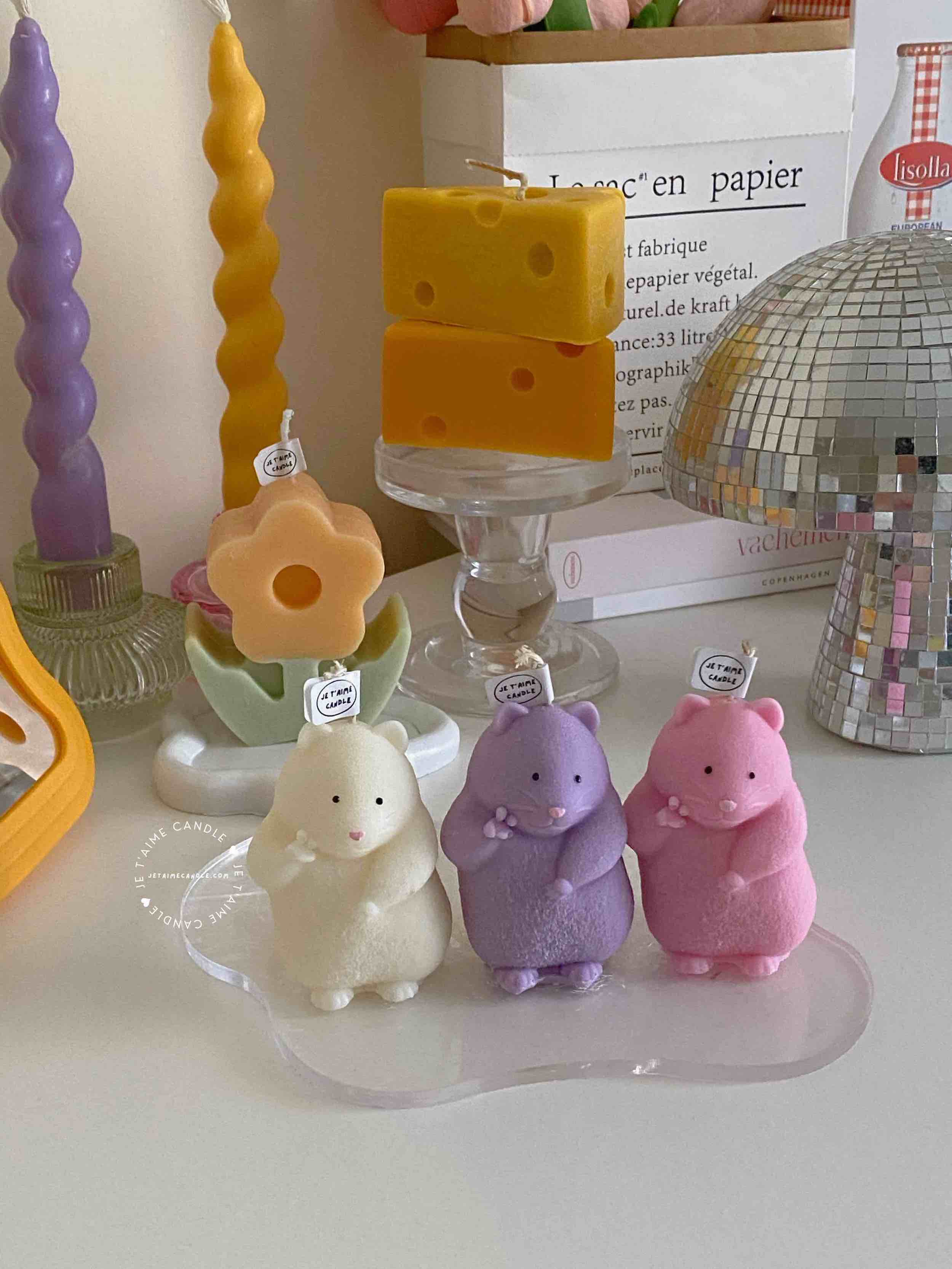 Adorable mouse figurines gathered on a table, perfect for bringing a playful vibe to your decor.
