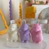 Adorable mouse figurines gathered on a table, perfect for bringing a playful vibe to your decor.