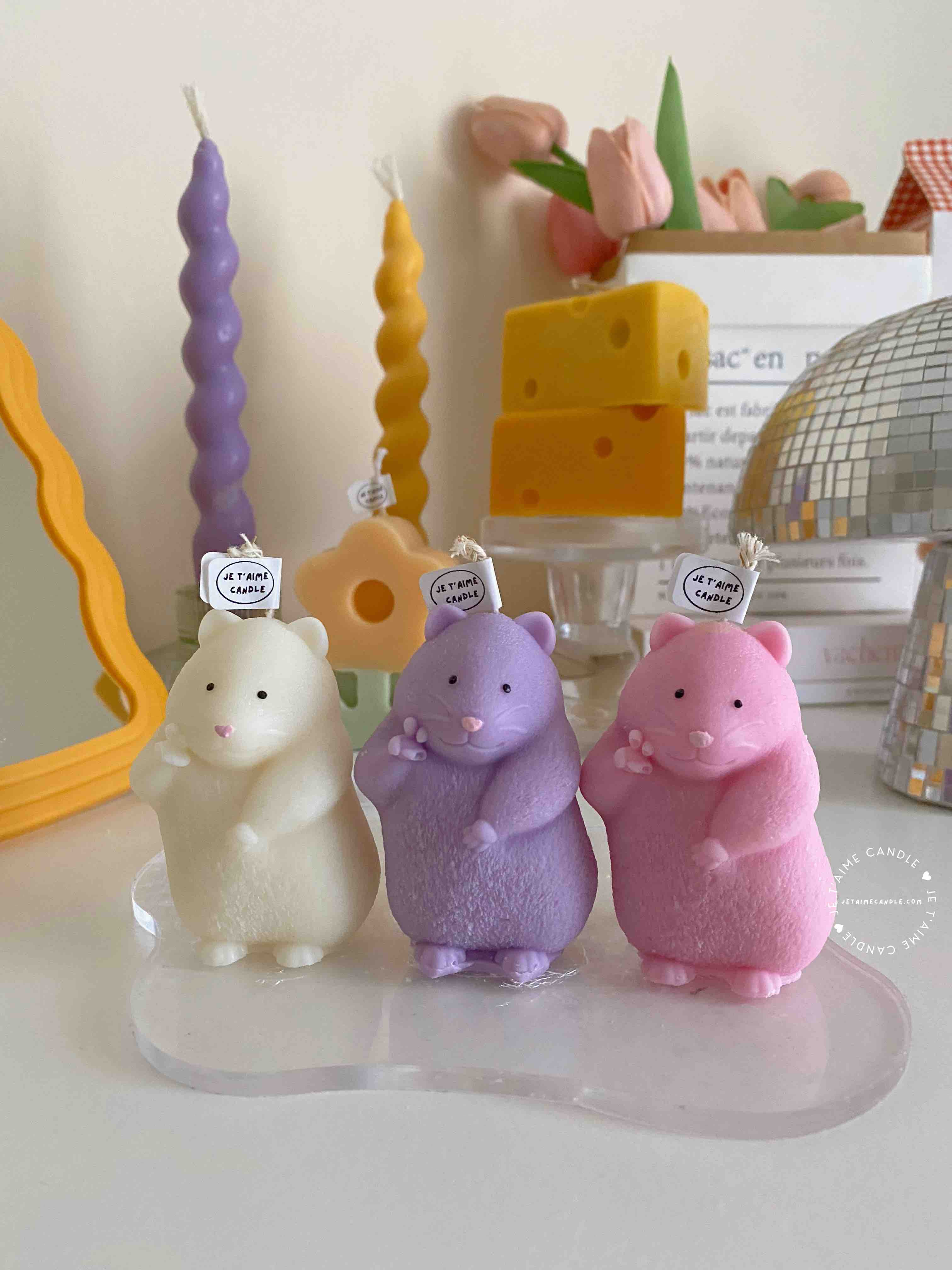 Adorable mouse figurines gathered on a table, perfect for bringing a playful vibe to your decor.