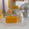 Adorable mouse figurines gathered on a table, perfect for bringing a playful vibe to your decor.