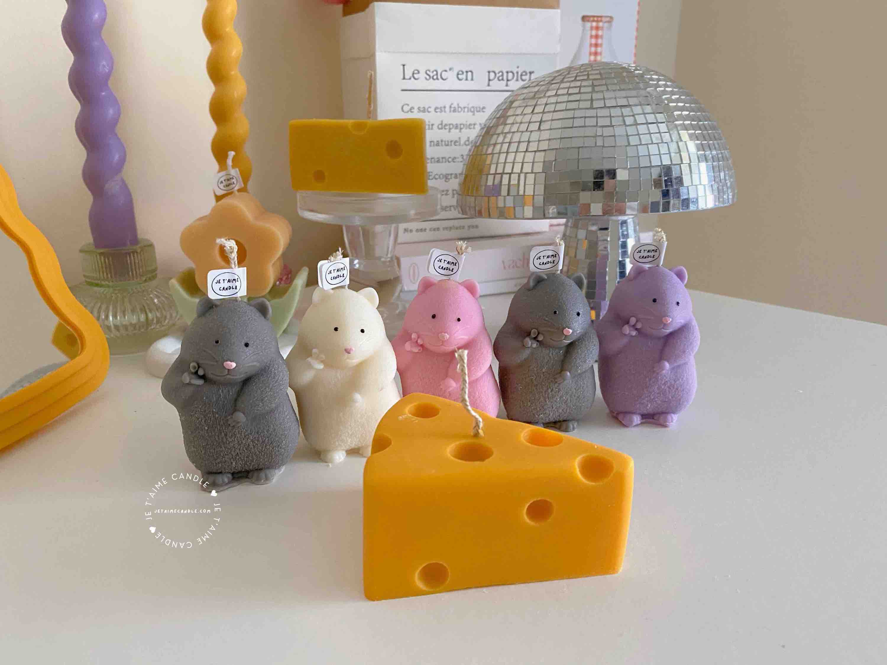Adorable mouse figurines gathered on a table, perfect for bringing a playful vibe to your decor.