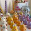 A collection of chubby duck-shaped candles on a table, perfect for duck lovers and quirky home decor enthusiasts.