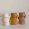 A cheerful group of four colorful smoking teddy bears, perfect for adding a touch of fun to any celebration or gift.