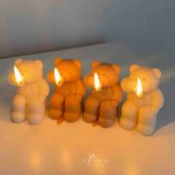 A cheerful group of four colorful smoking teddy bears, perfect for adding a touch of fun to any celebration or gift.